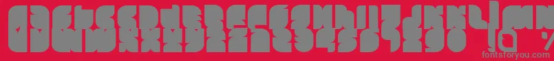 フォントTasious – 赤い背景に灰色の文字