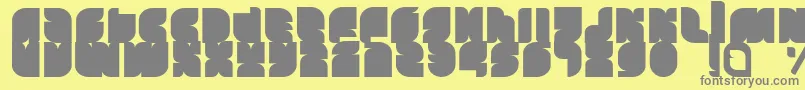 Tasious Font – Gray Fonts on Yellow Background