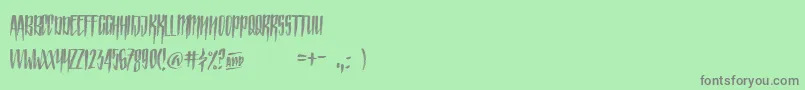 Czcionka StrainedCapitals – szare czcionki na zielonym tle