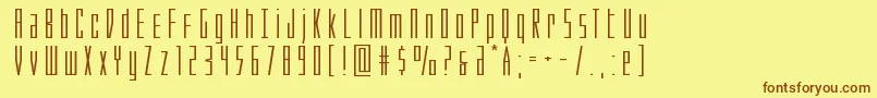 フォントPhantaconxtraexpand – 茶色の文字が黄色の背景にあります。