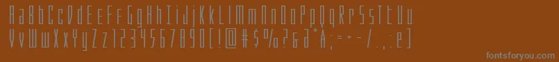 フォントPhantaconxtraexpand – 茶色の背景に灰色の文字