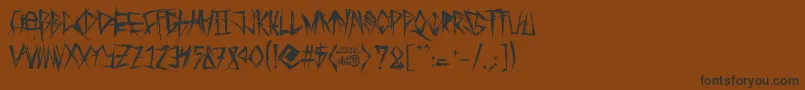 TribalThreat Font – Black Fonts on Brown Background