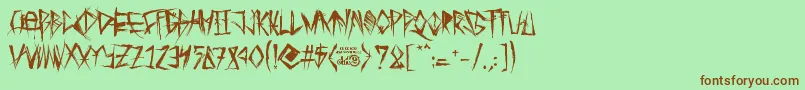 TribalThreat Font – Brown Fonts on Green Background