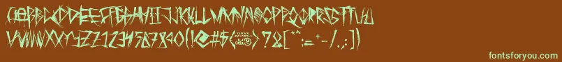 フォントTribalThreat – 緑色の文字が茶色の背景にあります。