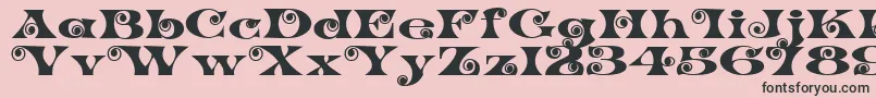 K22SpiralSwash Font – Black Fonts on Pink Background
