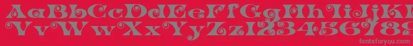 K22SpiralSwash Font – Gray Fonts on Red Background