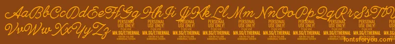 EthernallightPersonal Font – Orange Fonts on Brown Background