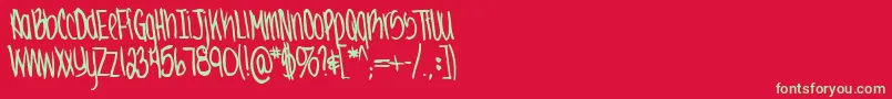 フォントJennabold – 赤い背景に緑の文字