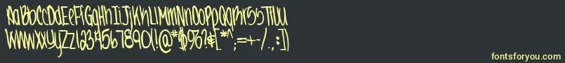 フォントJennabold – 黒い背景に黄色の文字