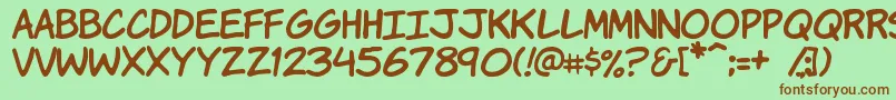 KomikaHand Font – Brown Fonts on Green Background