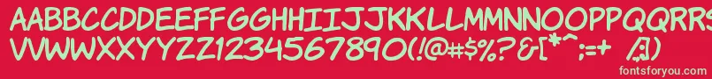 KomikaHand Font – Green Fonts on Red Background