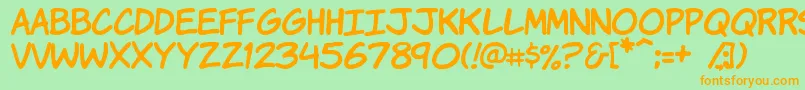 KomikaHand Font – Orange Fonts on Green Background