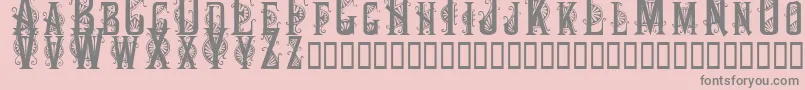 Decocaps Font – Gray Fonts on Pink Background