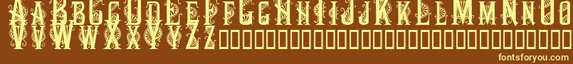 Decocaps Font – Yellow Fonts on Brown Background