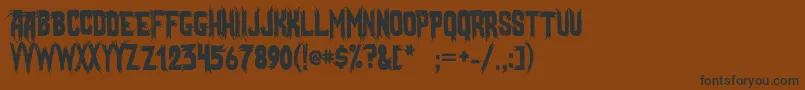 Шрифт MostlyGhostly – чёрные шрифты на коричневом фоне