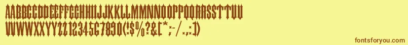 フォントIronwood – 茶色の文字が黄色の背景にあります。