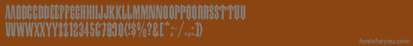 フォントIronwood – 茶色の背景に灰色の文字