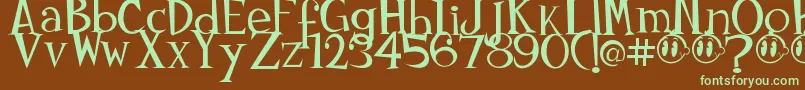 Johnyokonysm-fontti – vihreät fontit ruskealla taustalla