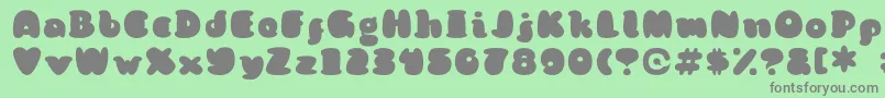 KongquestRegular Font – Gray Fonts on Green Background