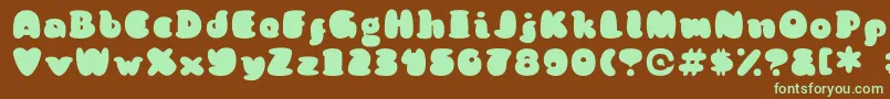 KongquestRegular Font – Green Fonts on Brown Background