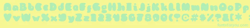 KongquestRegular Font – Green Fonts on Yellow Background