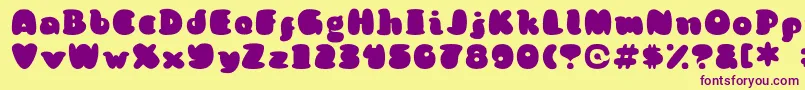 KongquestRegular Font – Purple Fonts on Yellow Background