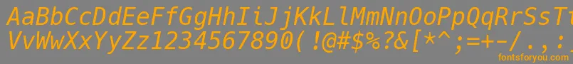 HackItalic-Schriftart – Orangefarbene Schriften auf grauem Hintergrund
