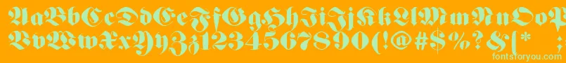 Germanfatman Font – Green Fonts on Orange Background