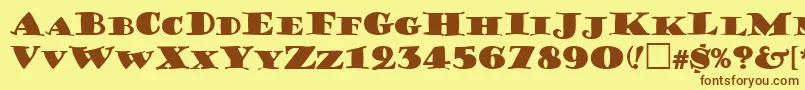 フォントGershwinCaps – 茶色の文字が黄色の背景にあります。