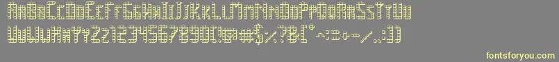 SpacePez3D-fontti – keltaiset fontit harmaalla taustalla