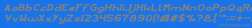 ArcadeItalic-fontti – harmaat kirjasimet sinisellä taustalla
