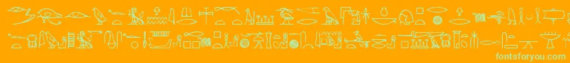 Yiroglyphics-Schriftart – Grüne Schriften auf orangefarbenem Hintergrund