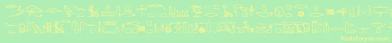 Yiroglyphics Font – Yellow Fonts on Green Background