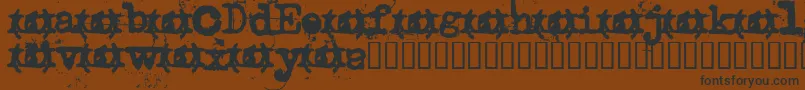 Uncletyp Font – Black Fonts on Brown Background