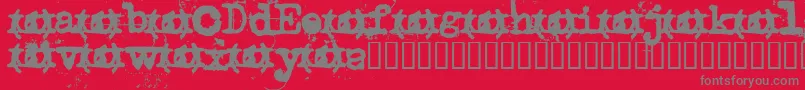 Uncletyp Font – Gray Fonts on Red Background