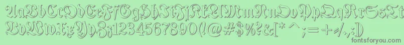 フォントTypographerfrakturShadow – 緑の背景に灰色の文字