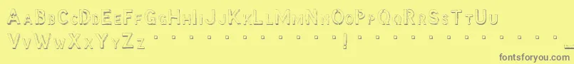 MccoyHellolori Font – Gray Fonts on Yellow Background