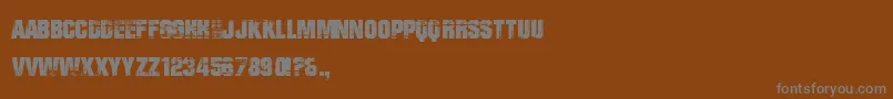 Czcionka BadGrunge – szare czcionki na brązowym tle