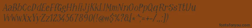 フォントRuffiano18 – 黒い文字が茶色の背景にあります