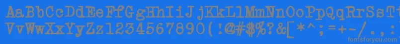 フォントPowdrft – 青い背景に灰色の文字