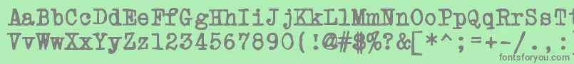 フォントPowdrft – 緑の背景に灰色の文字