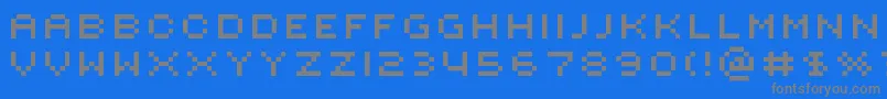 フォントRotorcapExtended – 青い背景に灰色の文字