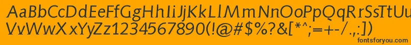 Шрифт Aidaserifobliquemedium – чёрные шрифты на оранжевом фоне