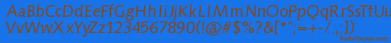 フォントAidaserifobliquemedium – 茶色の文字が青い背景にあります。