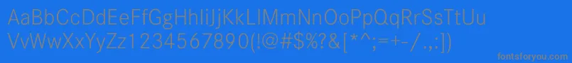 CorporateSW15Light-fontti – harmaat kirjasimet sinisellä taustalla