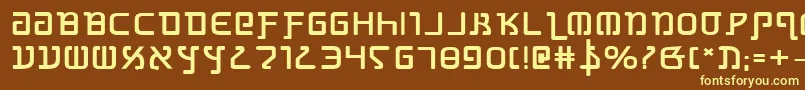 GrimlordBoldExpanded-fontti – keltaiset fontit ruskealla taustalla