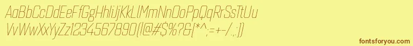 フォントQuarcacondthinitalic – 茶色の文字が黄色の背景にあります。