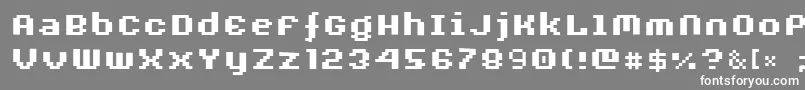 フォントAuxDotbitcXtraBold – 灰色の背景に白い文字