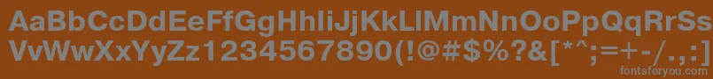 フォントPrg75Ac – 茶色の背景に灰色の文字