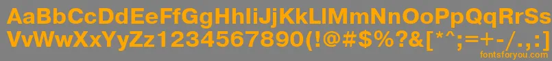 フォントPrg75Ac – オレンジの文字は灰色の背景にあります。